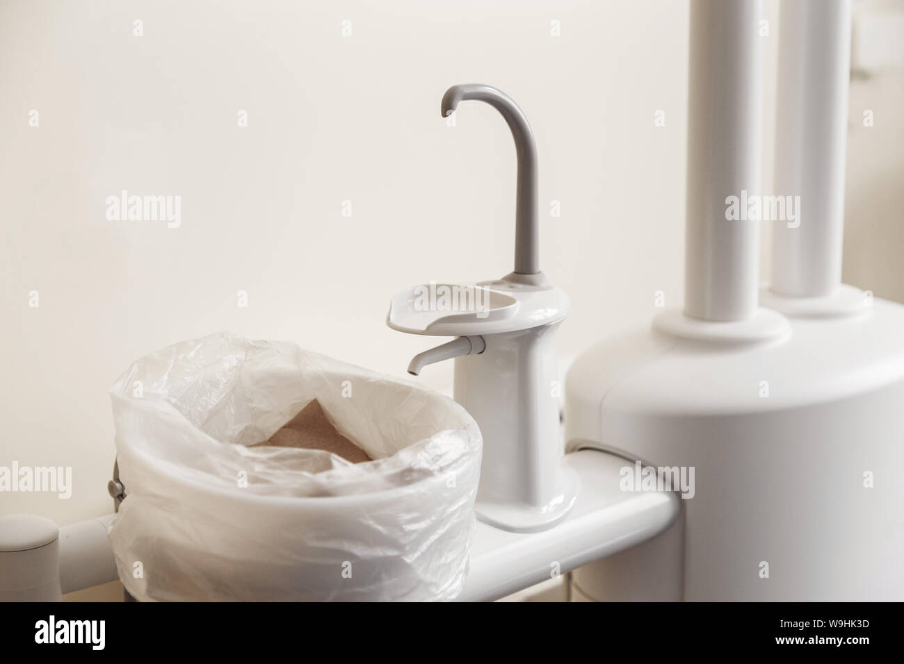 Close-up dentist sink with tap equipment Stock Photo - Alamy