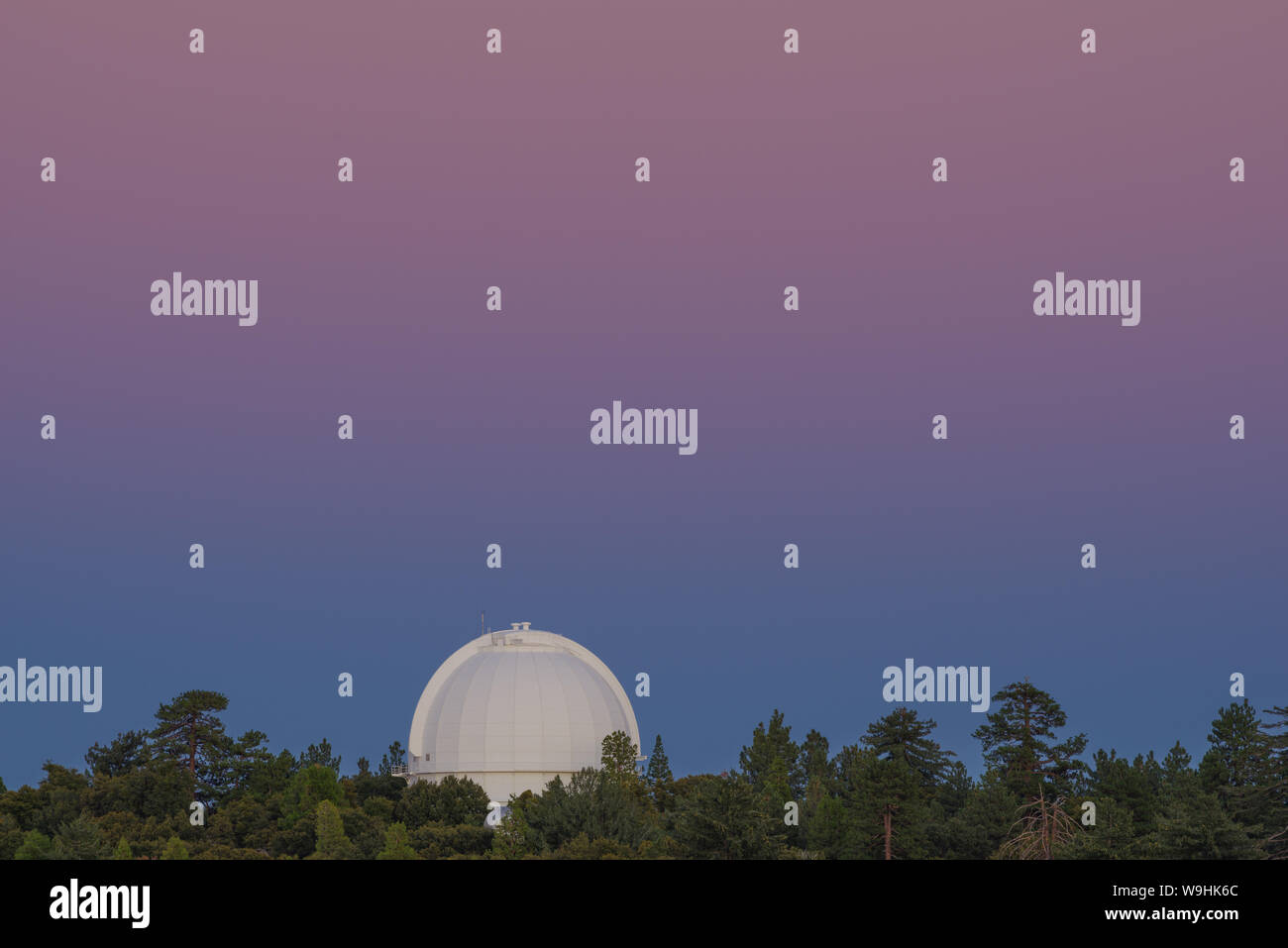 Image taken during the blue hour at Mt Wilson in California showing  an observatory dome. Stock Photo