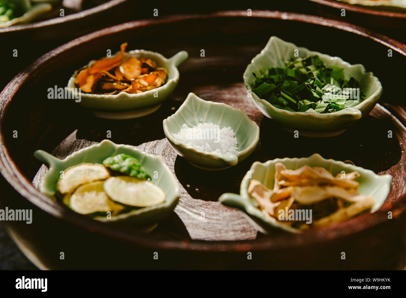 set of herbal spa treatments skin care salt bergamot sliced pandan leaf turmeric and curcumin Stock Photo