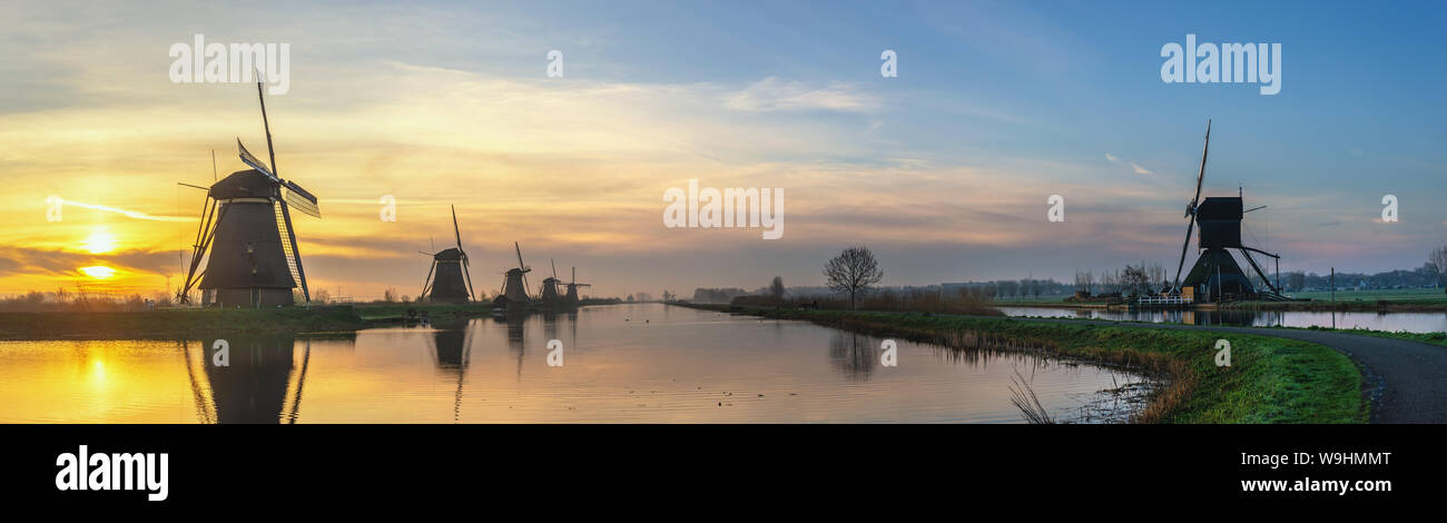 Rotterdam Netherlands, sunrise panorama landscape of Dutch Windmill at Kinderdijk Village Stock Photo