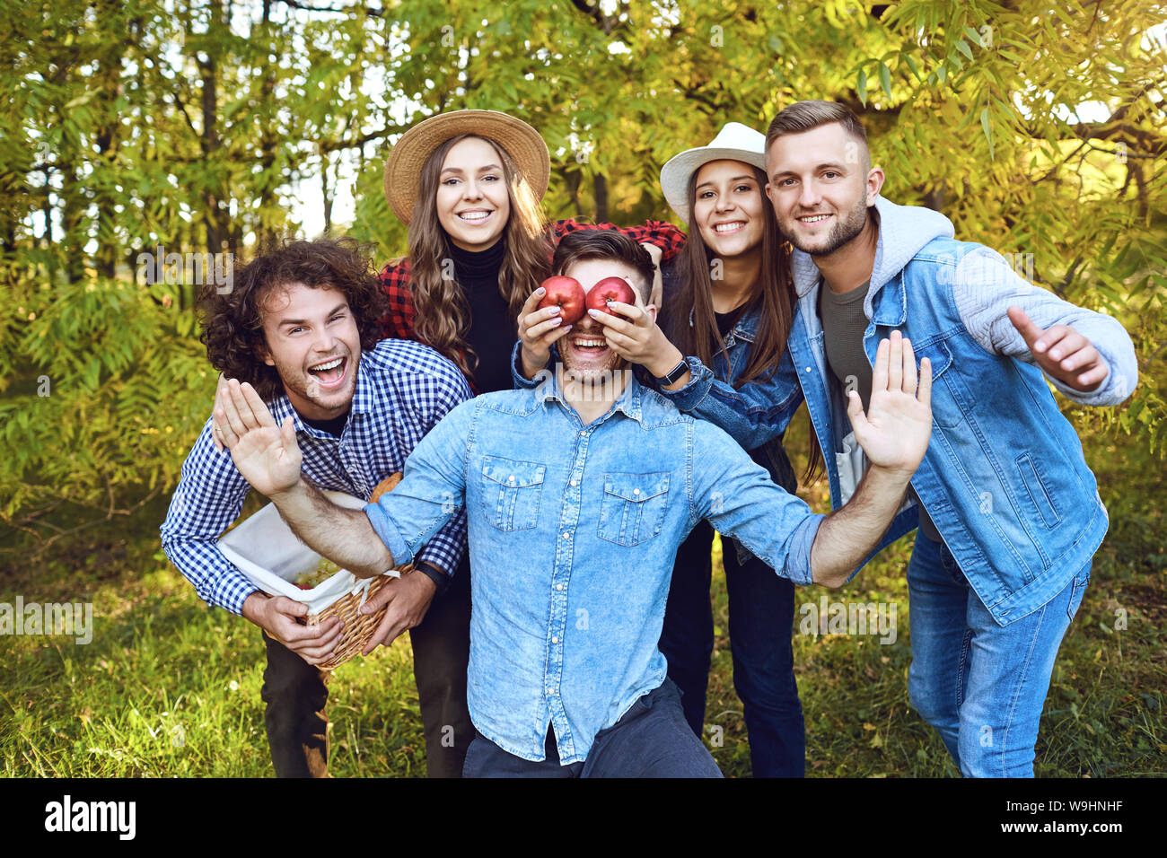 Cheerful friends are laughing in the park. Stock Photo