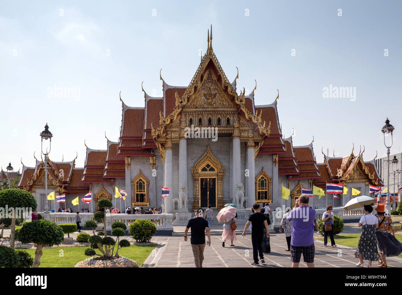 Tourists visiting the Marble Temple in Bangkok Stock Photo