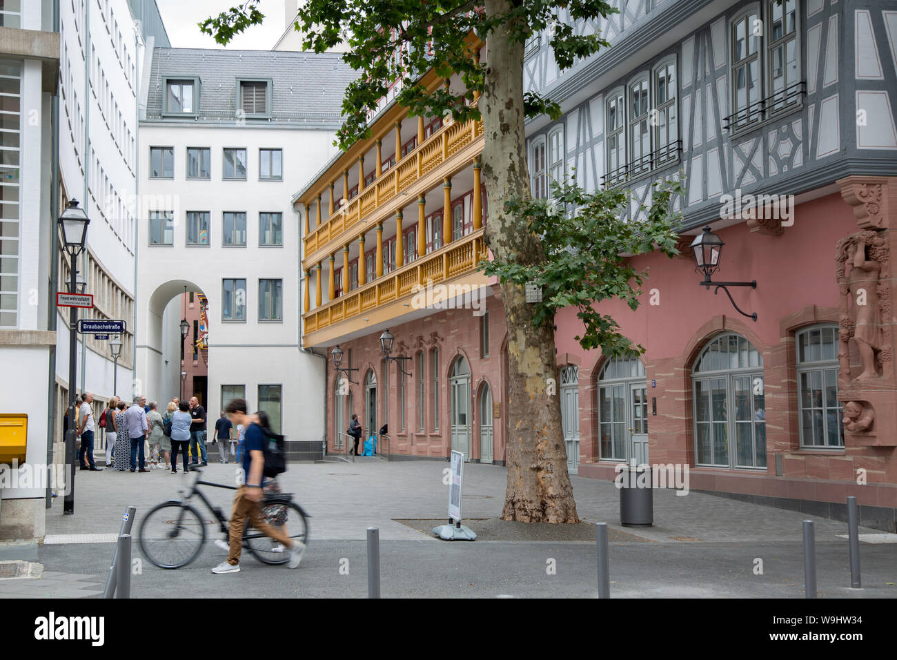 Cyclist on Braubachstrabe and Rebstock Street; Frankfurt; Germany Stock Photo