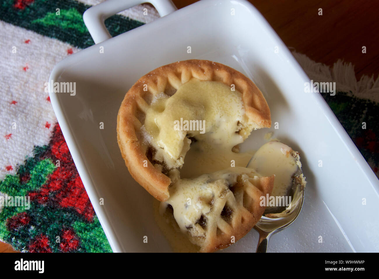 Minced tart on a white dish at Christmas time. Stock Photo