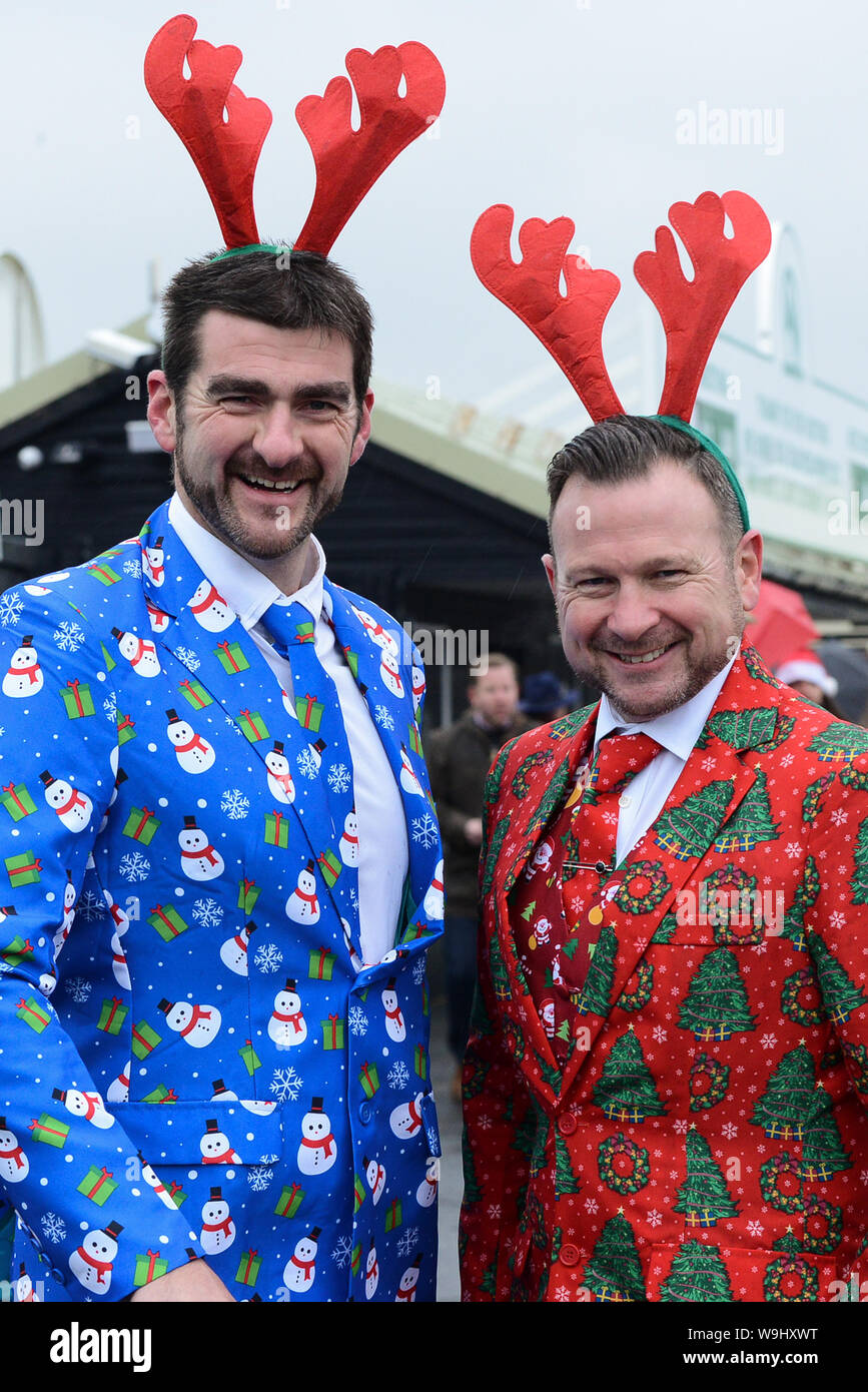 Christmas Jumper Raceday at Hereford Racecourse - Adam Huselbee & Mike Robinson sporting Christmas suits. Stock Photo