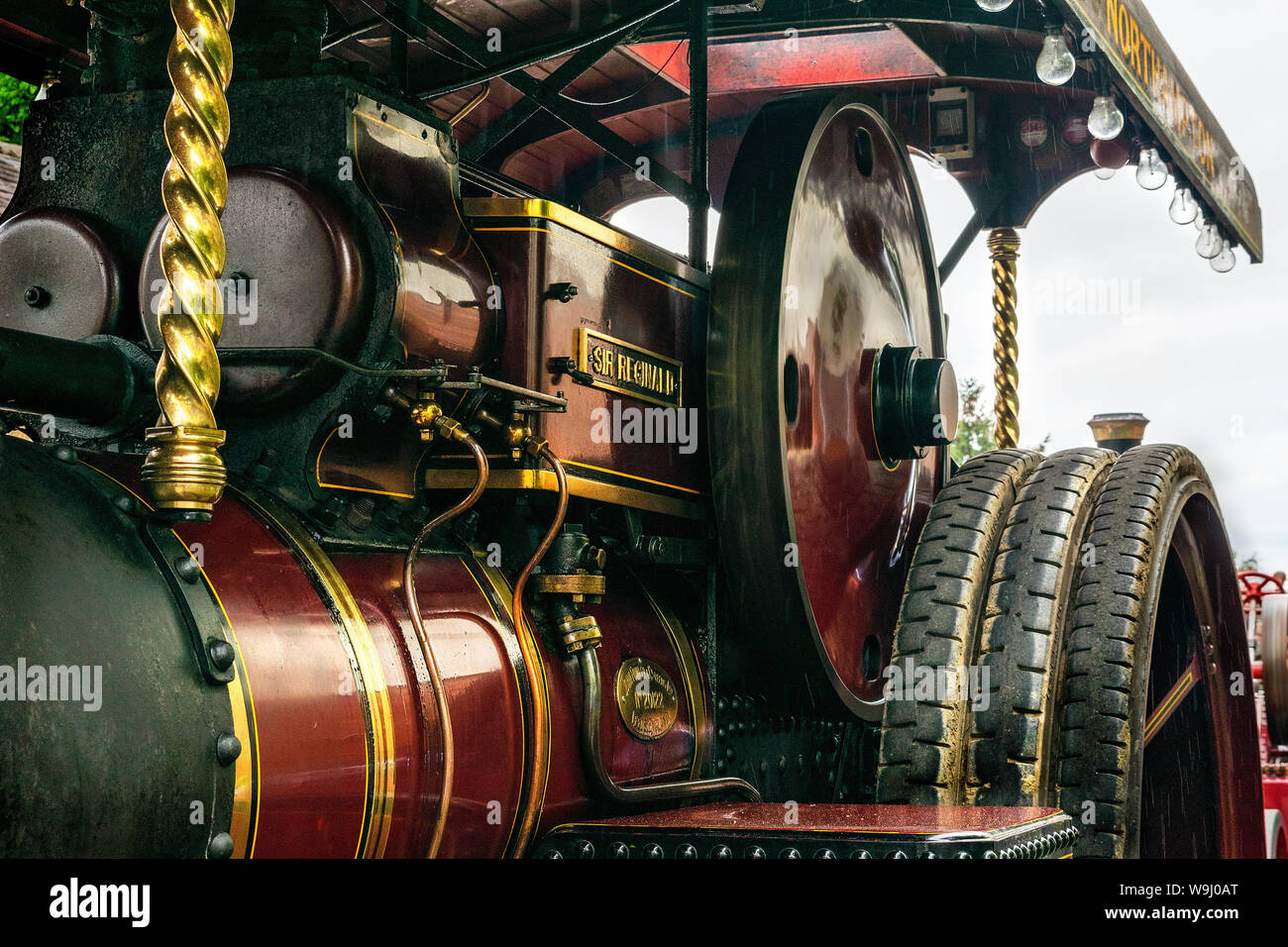 Parts of a steam engine in closeup showing the intricate details of