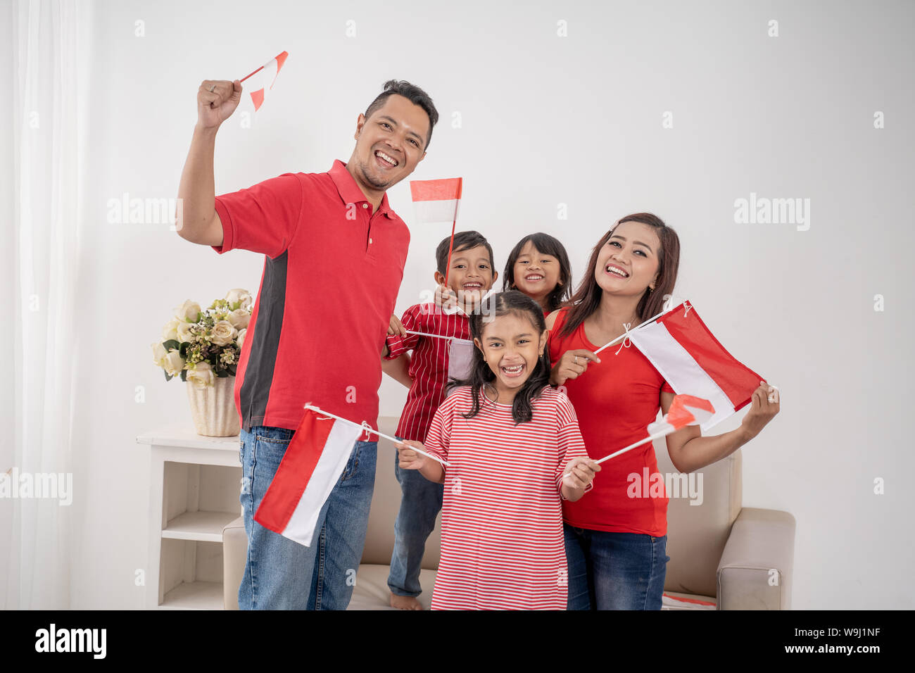 family indonesia celebrating independence day Stock Photo - Alamy