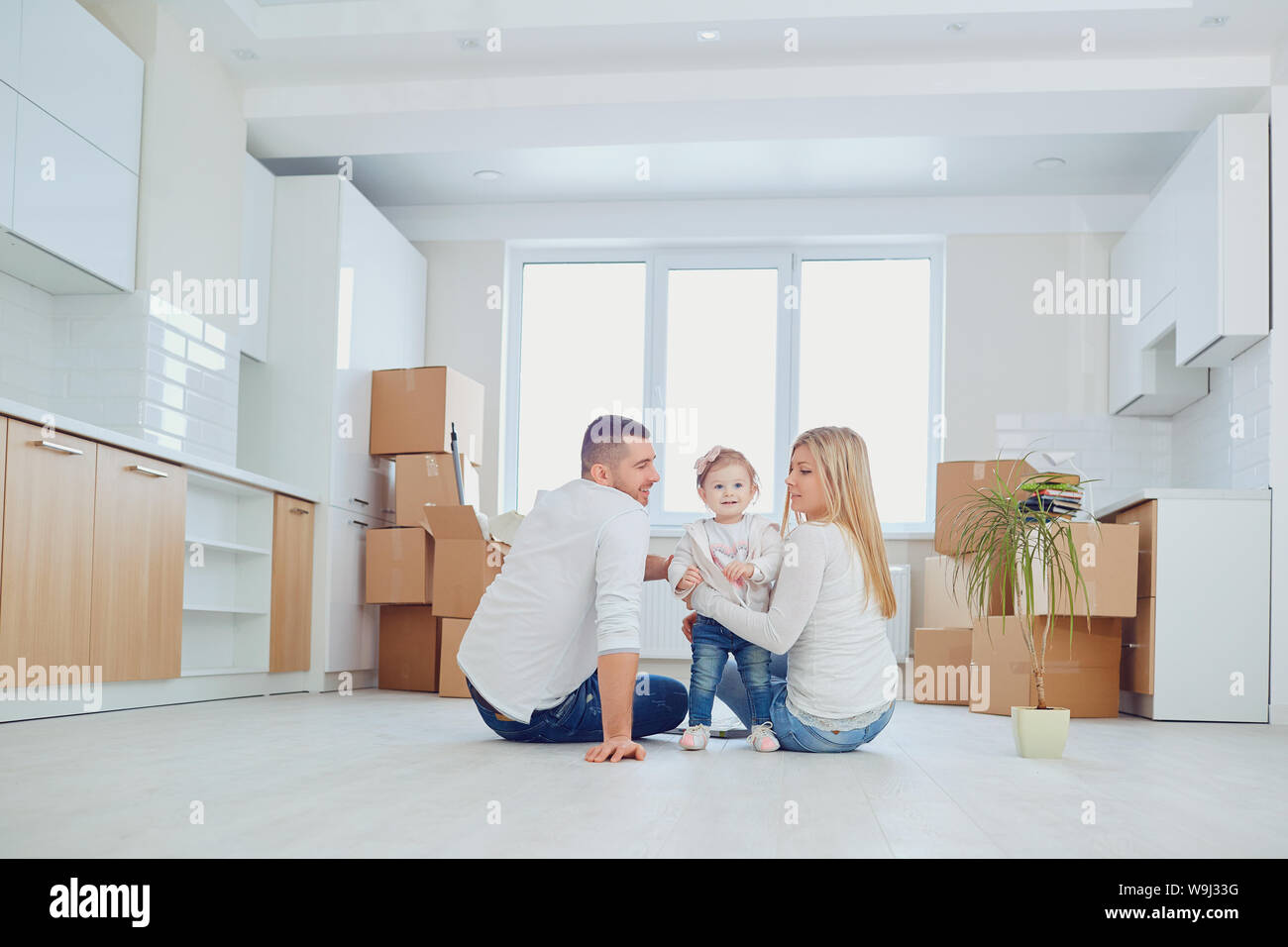 Happy family relocation at new house Stock Photo