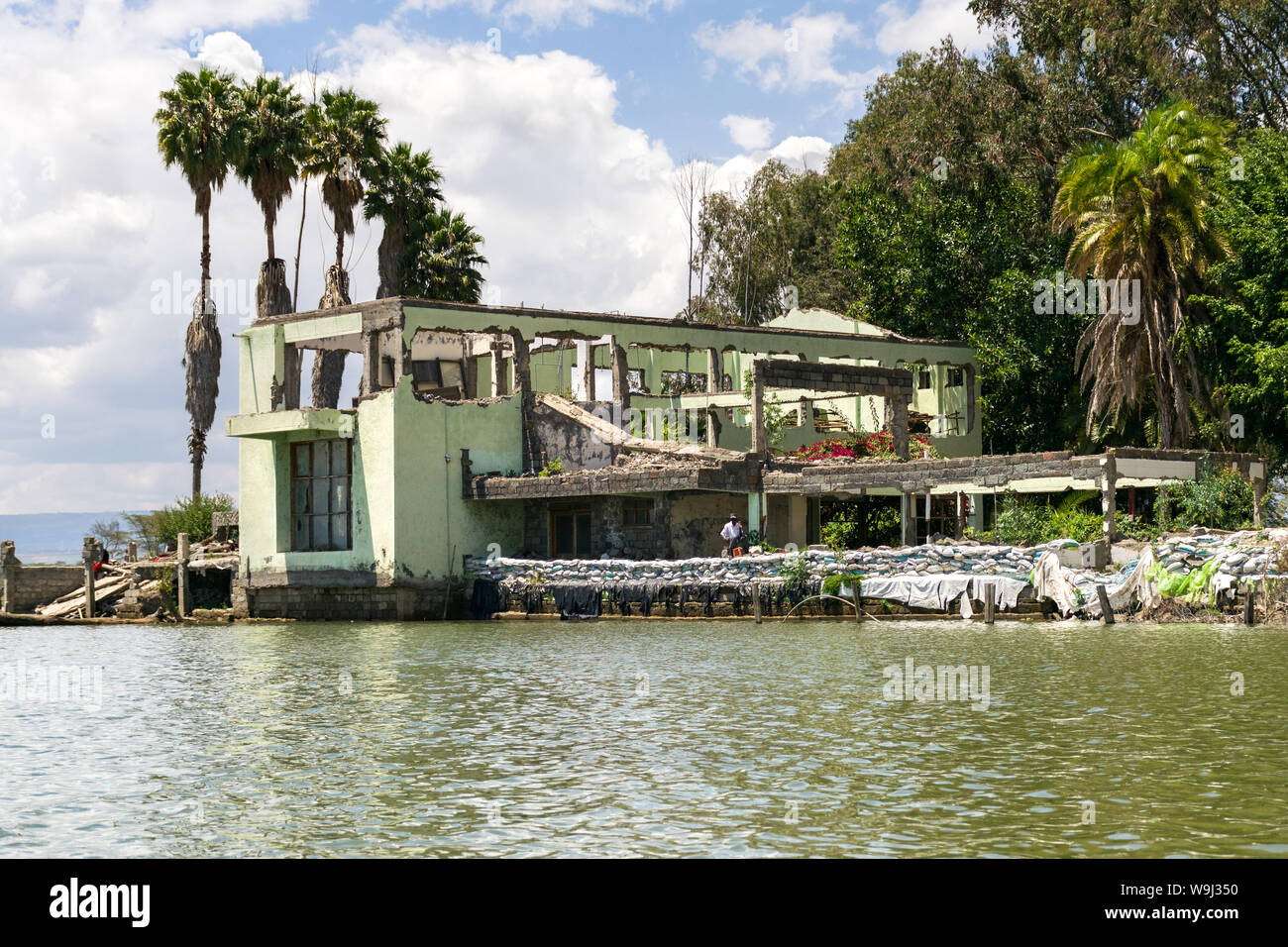 A dilapidated ruined building due to rising water levels on the shore of lake Naivaha, Kenya, East Africa Stock Photo