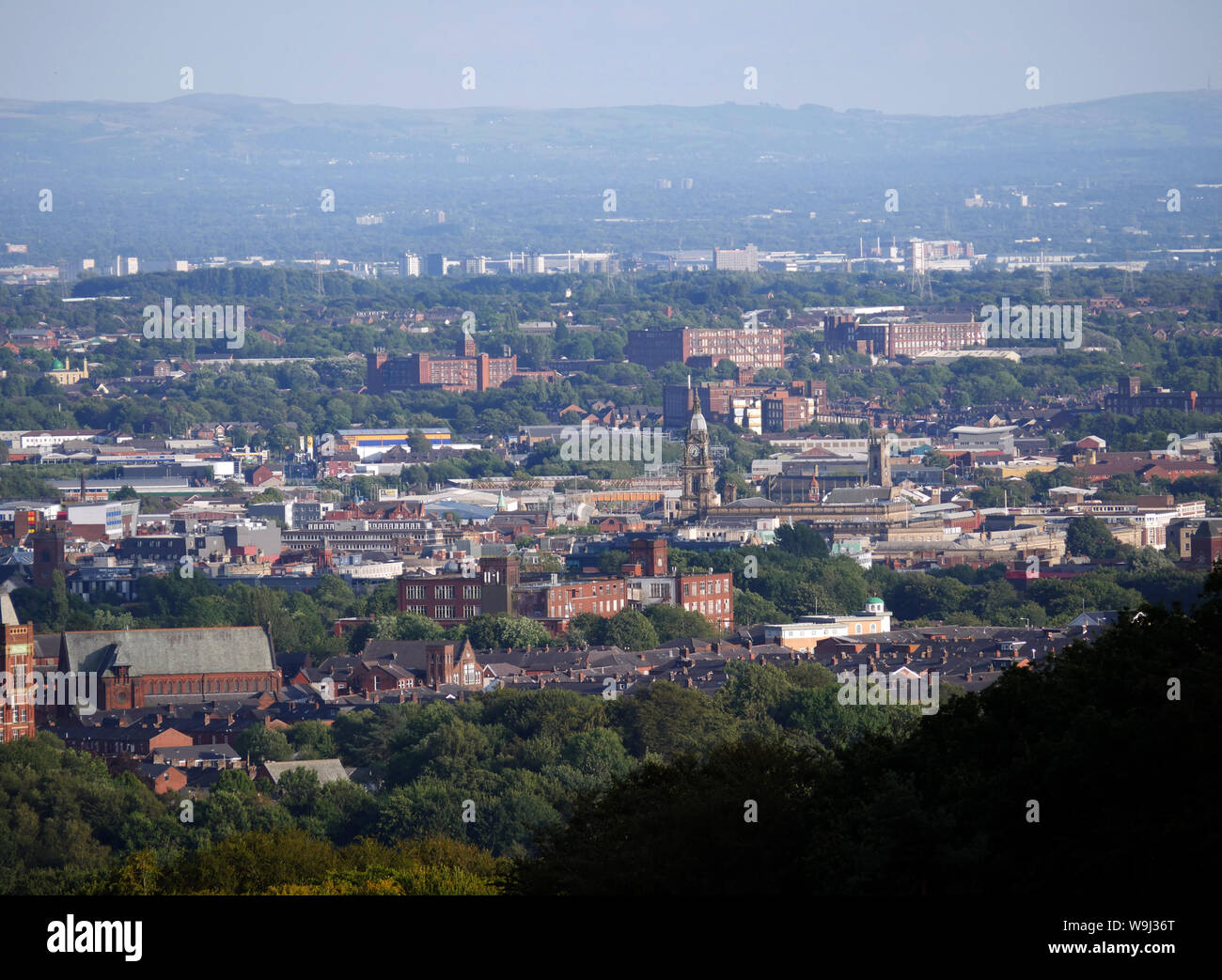 View looking over the town of Bolton with the city Manchester in the distance. Bolton Town Hall central right. photo DON TONGE Stock Photo