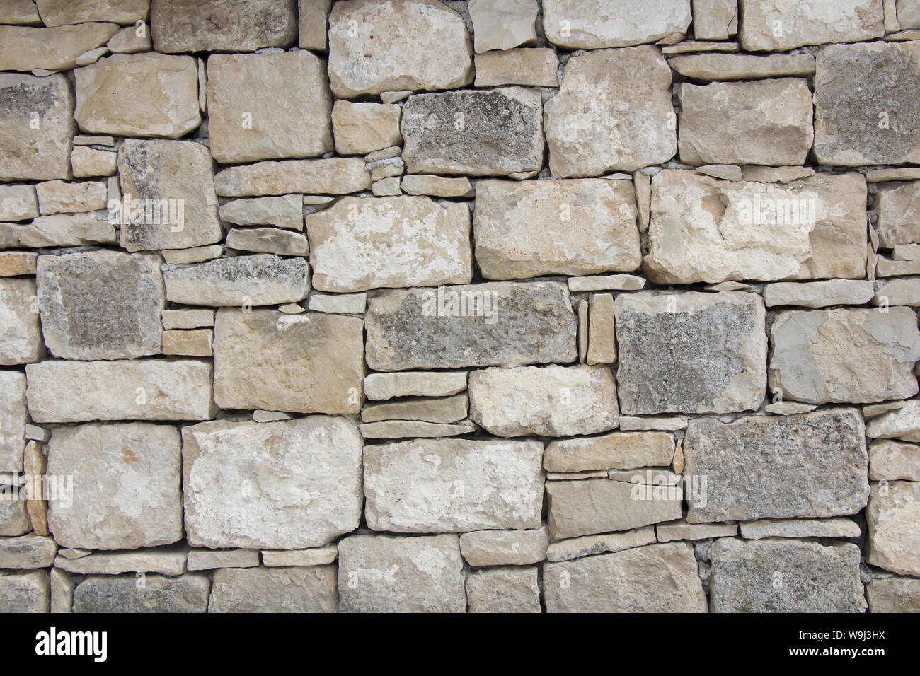 Closeup of dry stone wall as background Stock Photo