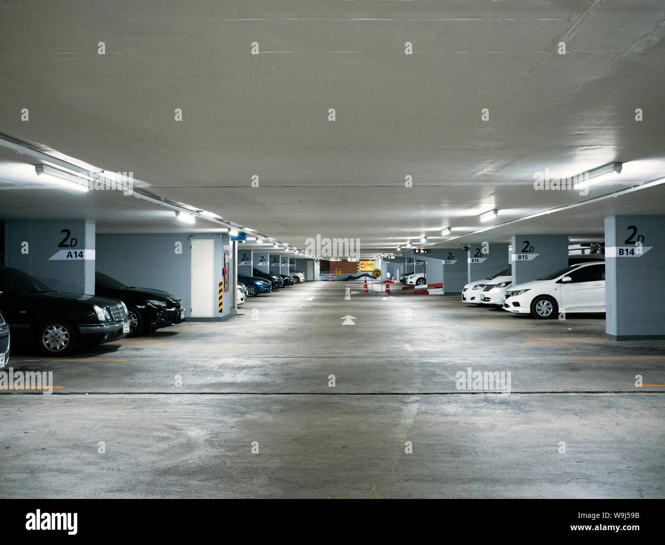 Parking in the building, Car parking building hall with column Stock Photo Alamy