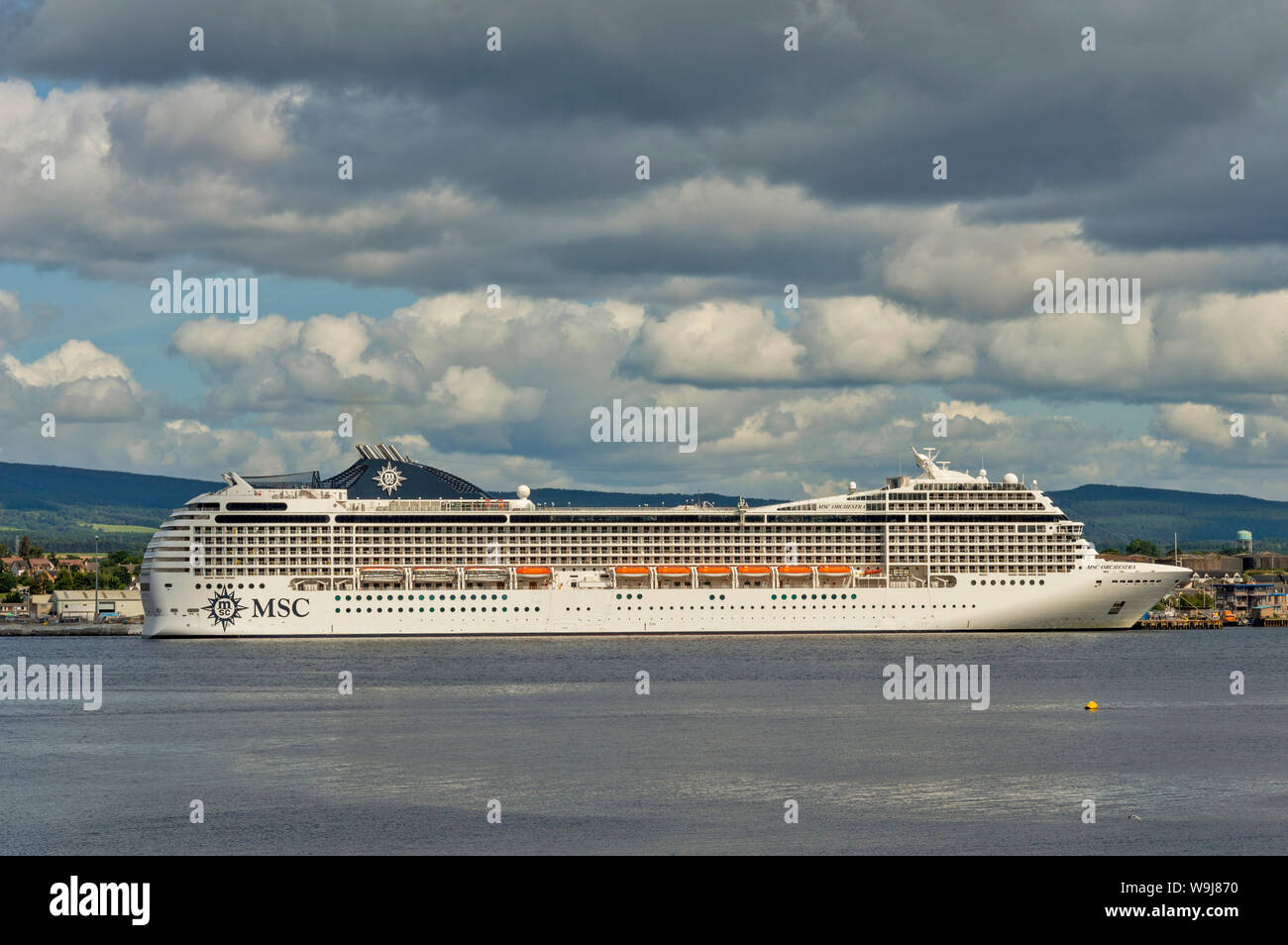 CROMARTY FIRTH ROSS AND CROMARTY SCOTLAND MSC ORCHESTRA CRUISE LINER LYING OFF INVERGORDON IN SUMMER Stock Photo
