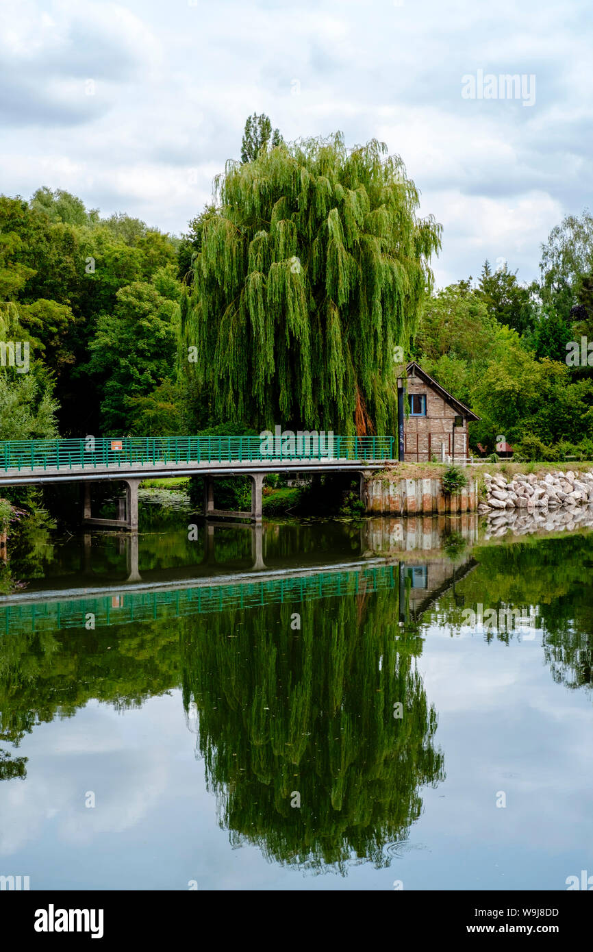 Amiens, France: Parc Saint-Pierre with Somme river, August 2019. The popular park is close to the Hortillonages, medieval kitchen gardens the town is Stock Photo