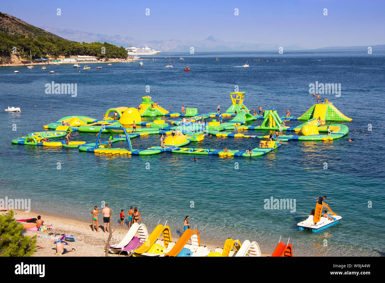 BOL, CROATIA - AUGUST 06, 2019: Water fun park on a Zlatni Rat beach in Bol  on the island of Brac Stock Photo - Alamy