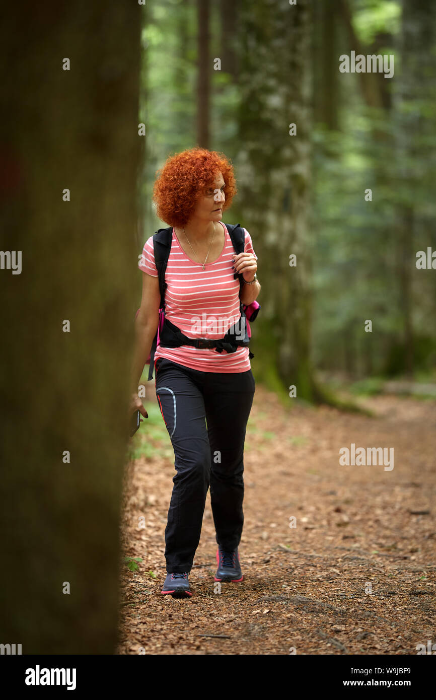 Curly redhead woman hiking hi-res stock photography and images - Alamy