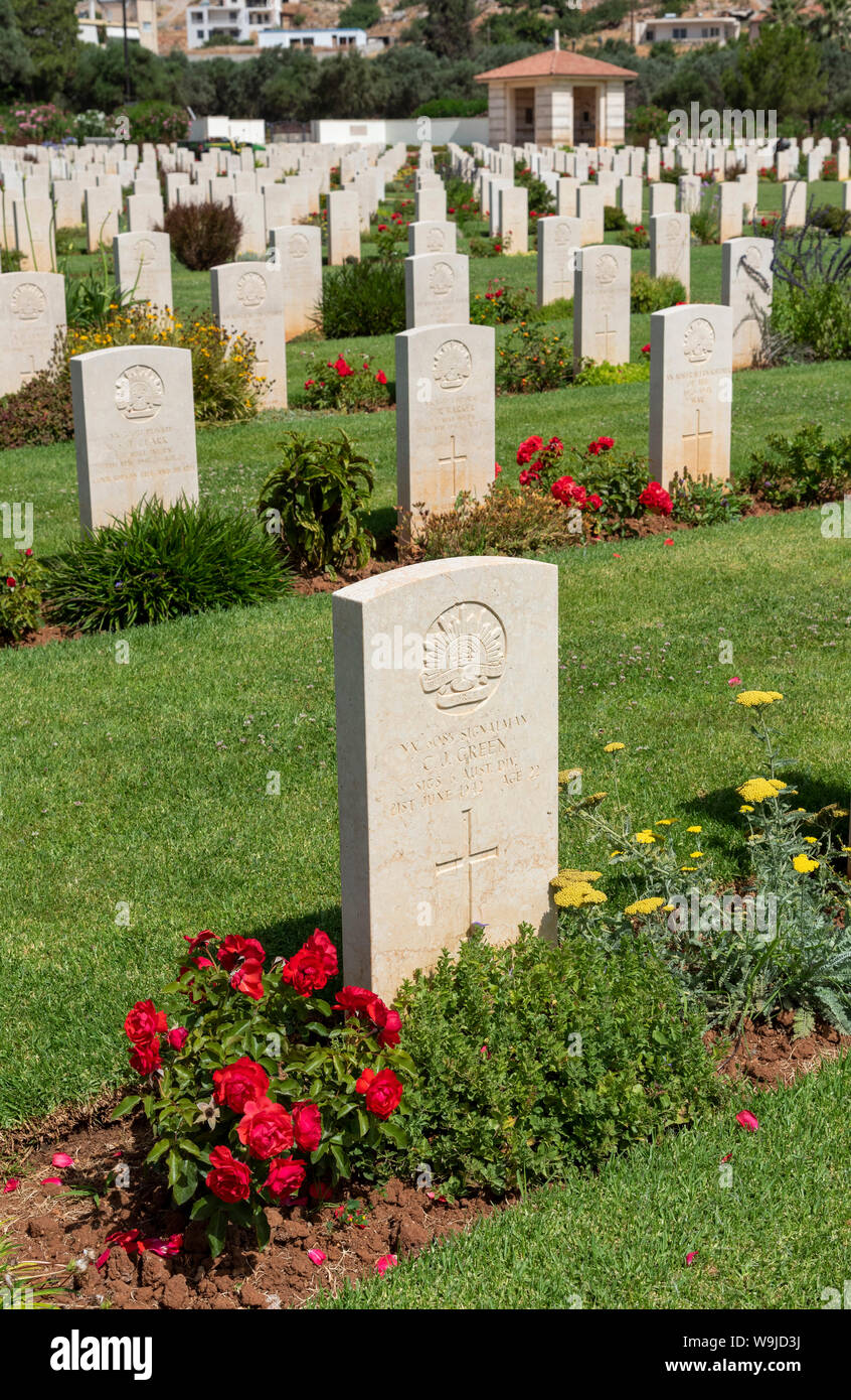 Suda Bay War Cemetery, Crete, Greece. June 2019. Memorial stone to Australian serviceman  of the Australian Imperial Force, Signalman C J Green. Aged Stock Photo
