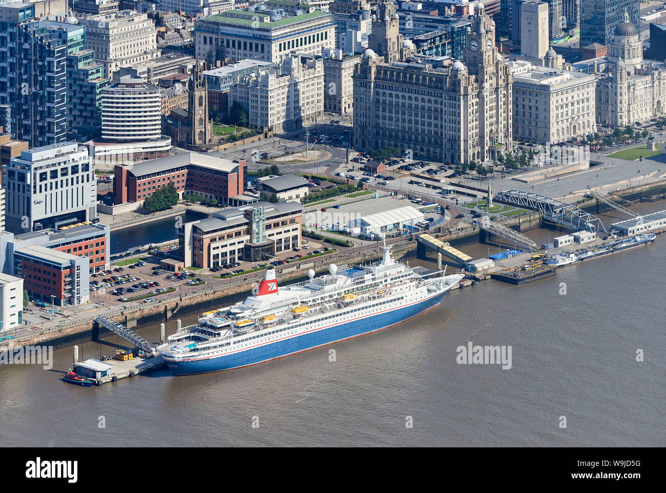 A Fred Olsen line Cruise ship, Black Watch and the Dazzle Mersey Ferry shot from the air, Liverpool, waterfront, North West England, UK Stock Photo