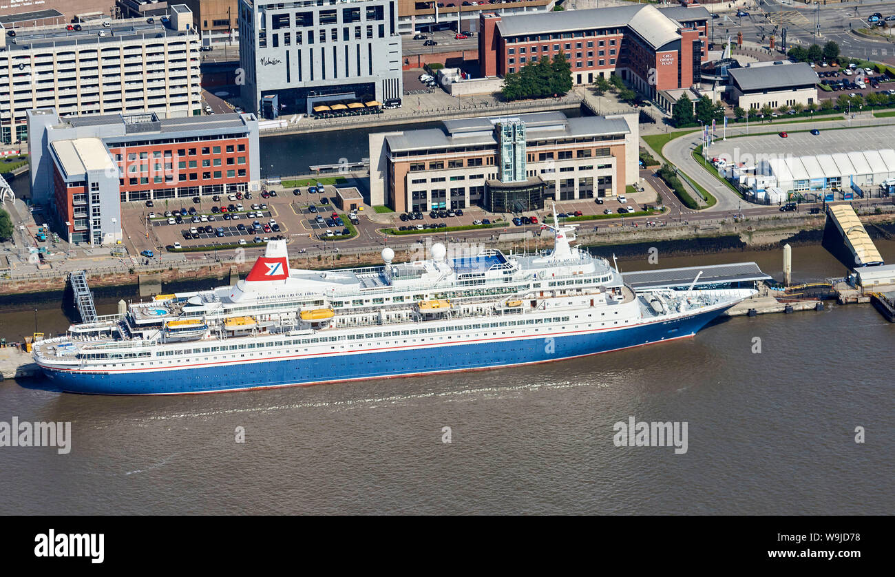 A Fred Olsen line Cruise ship, Black Watch and the Dazzle Mersey Ferry shot from the air, Liverpool, waterfront, North West England, UK Stock Photo