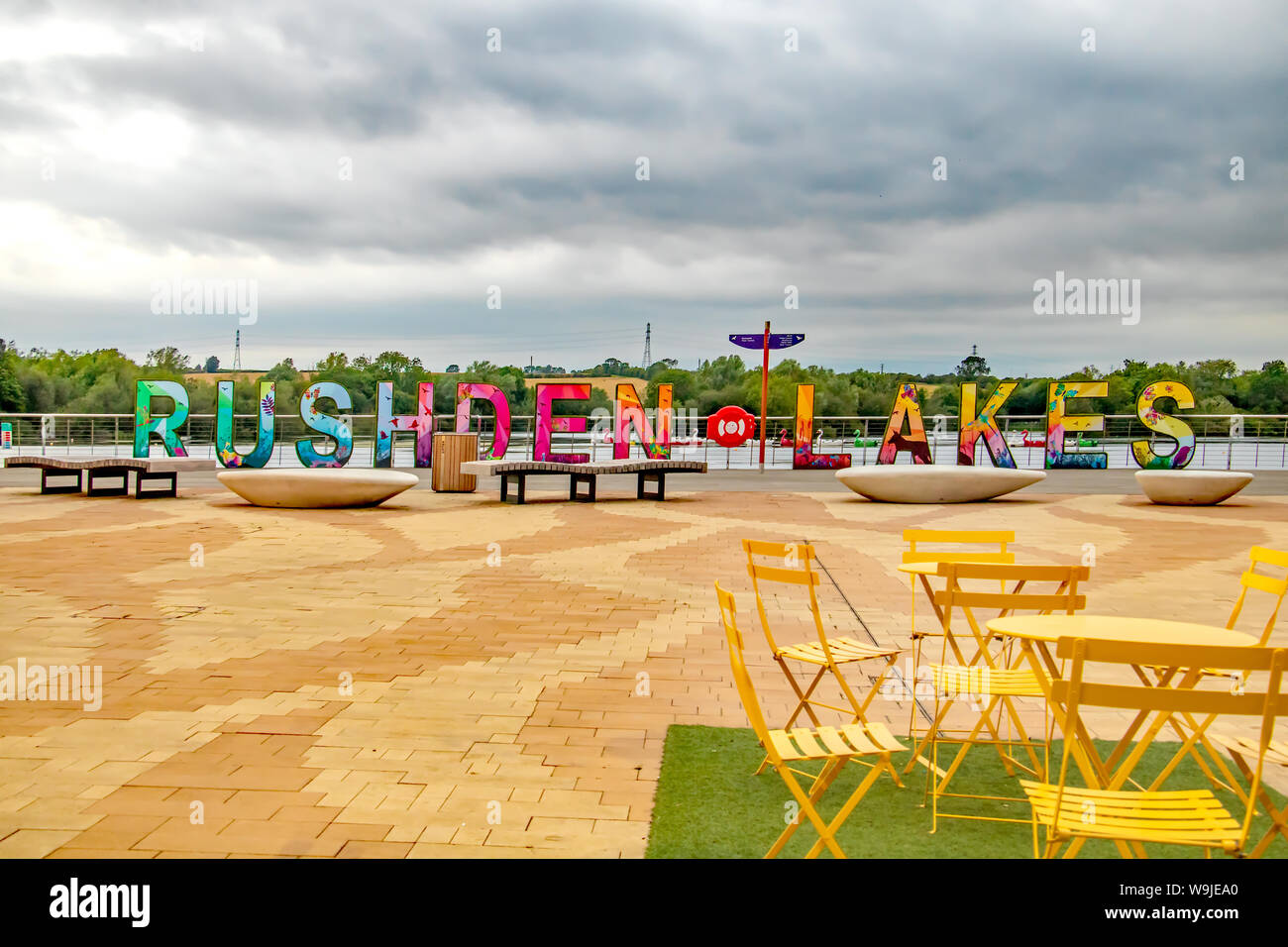 The Rushden Lakes sign is a colorful focal point for the lakeside
