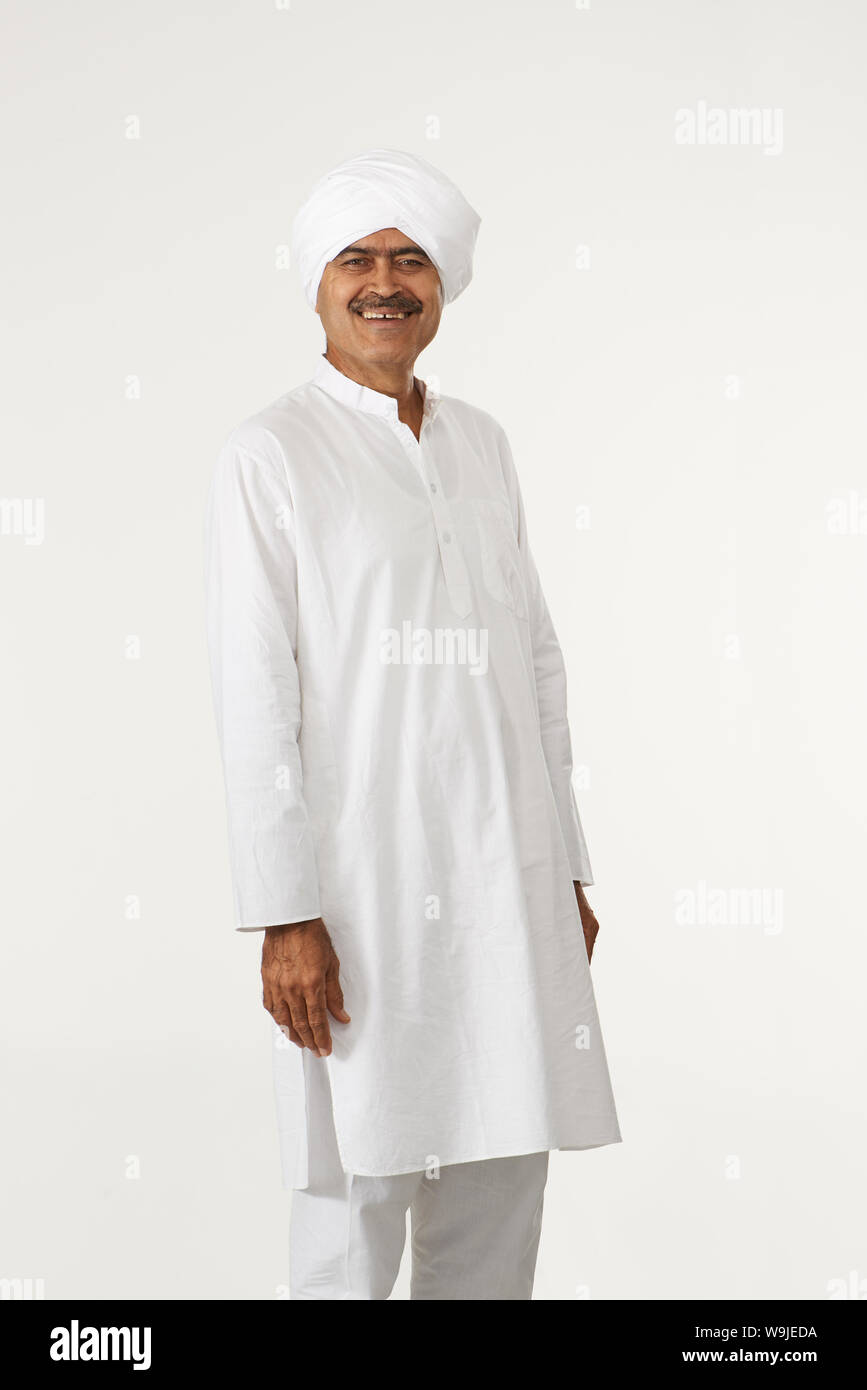 White Rural Guy Rural man standing and smiling Stock Photo - Alamy