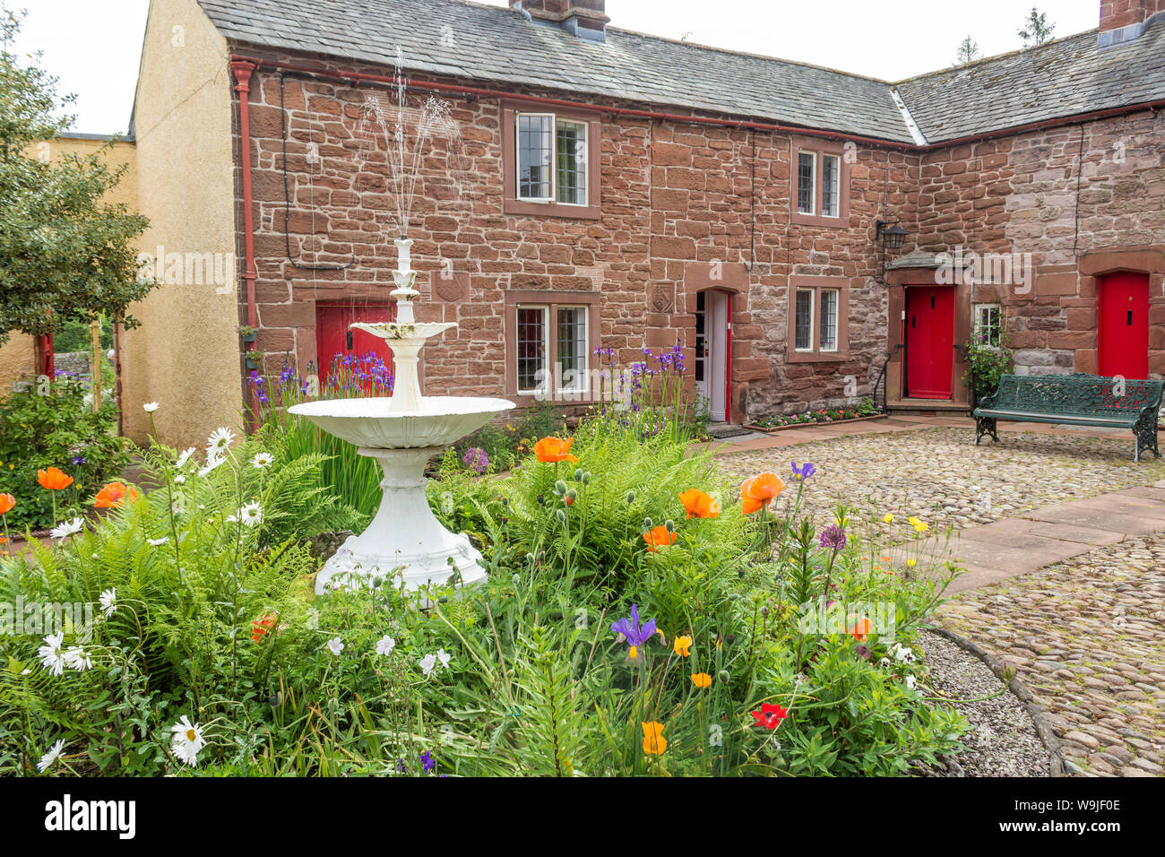 Appleby-in-Westmorland, Cumbria, England. The cobbled courtyard of St Anne's Hospital and Chapel. Stock Photo