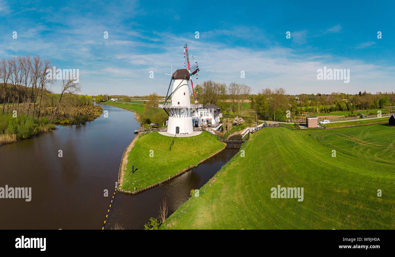 Tower windmill called De Vlinder,  The Butterfly,  at the bank of the river Linge, Deil,   Gelderland, , Netherlands, 30071511 *** Local Caption *** w Stock Photo