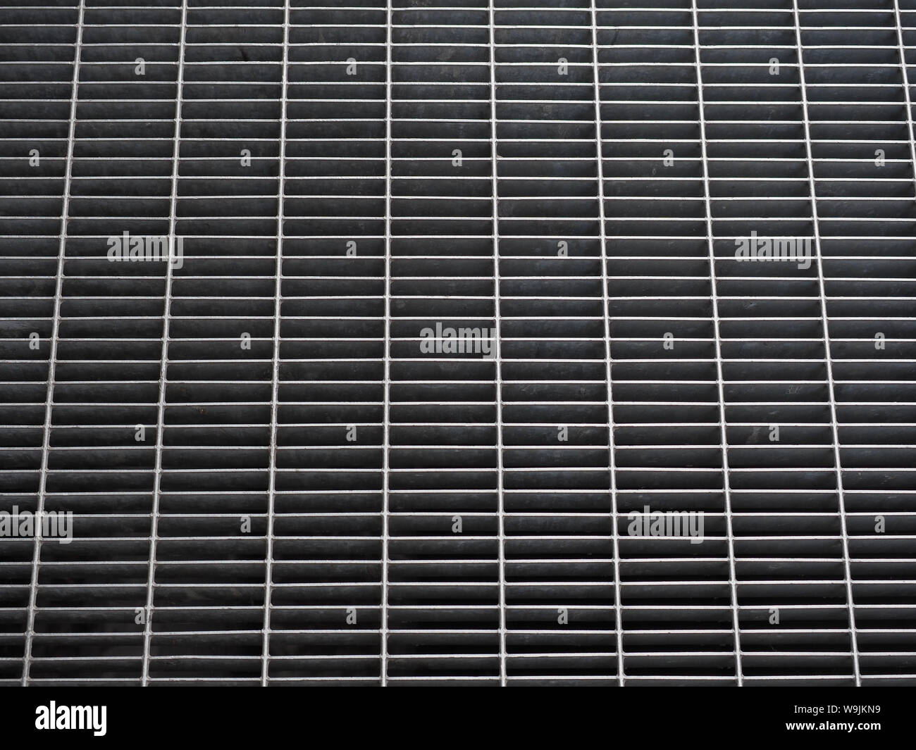 grey steel grid texture useful as a background Stock Photo