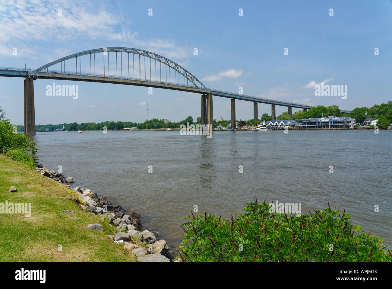 The Chesapeake City bridge crosses over the Chesapeake & Delaware Canal in Maryland and was built in 1949 by the U.S. Army Corps of Engineers Stock Photo