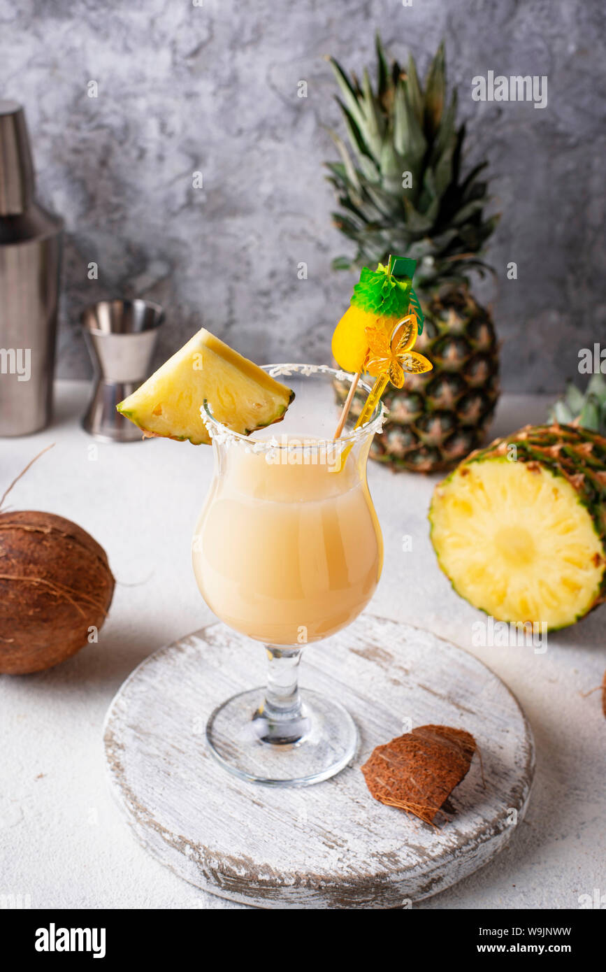 Pina colada cocktail with coconut and pineapple Stock Photo - Alamy
