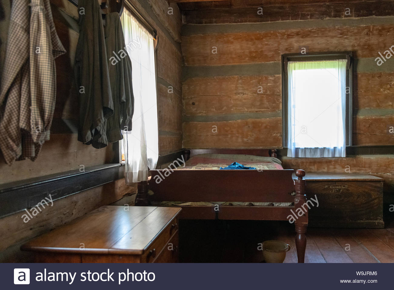 Furniture Inside A Colonial Style Bedroom In A Traditional