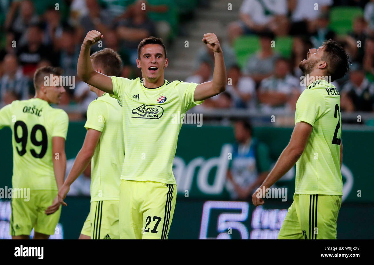 BUDAPEST, HUNGARY - AUGUST 13: (l-r) Tokmac Chol Nguen of Ferencvarosi TC  wins the ball from Arijan Ademi of GNK Dinamo Zagreb during the UEFA  Champions League Third Qualifying Round match between