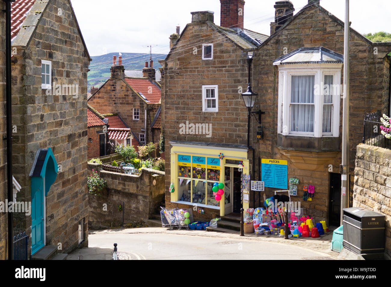 Traditional Seaside shop selling toys, buckets and spades in the traditional fishing village of Robin Hood’s Bay. Stock Photo