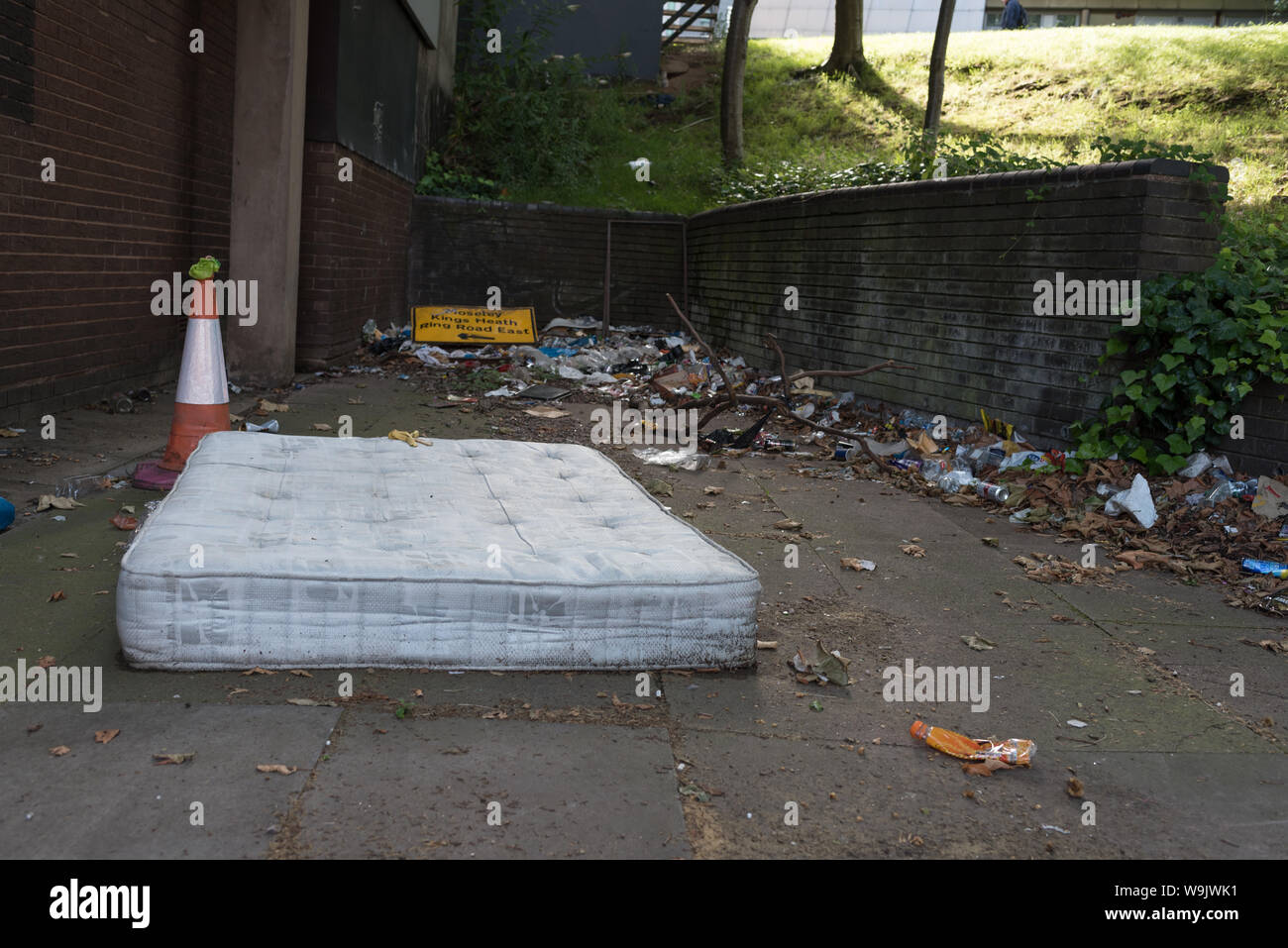 fly tipping on streets rubbish dumped anywhere Stock Photo