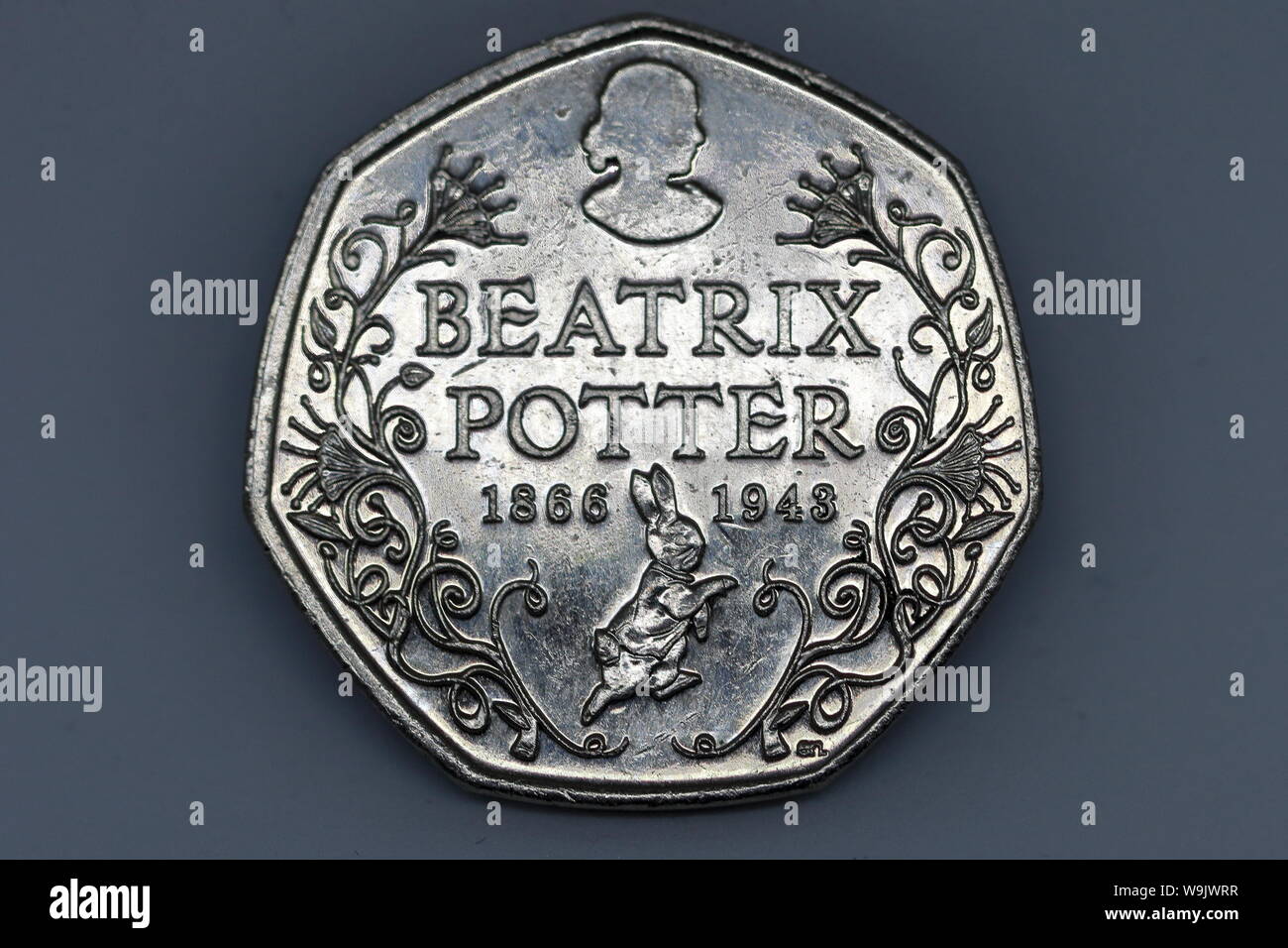 Tails side of a U.K. Fifty pence celebrating the life of Beatrix Potter Stock Photo