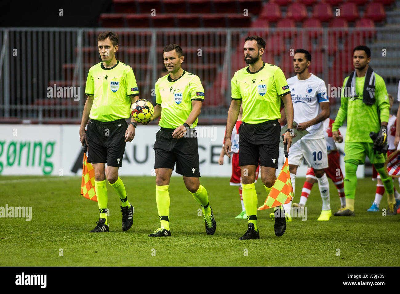 Copenhagen, Denmark. 13th Aug, 2019. Referee Gediminas Mazeika enters the pitch for the Champions League qualification match between FC Copenhagen and Red Star Belgrade at Telia Parken. (Photo Credit: Gonzales Photo/Alamy Live News Stock Photo