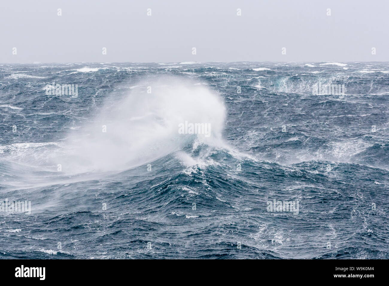 Gale force westerly winds build large waves in the Drake Passage, Antarctica, Polar Regions Stock Photo