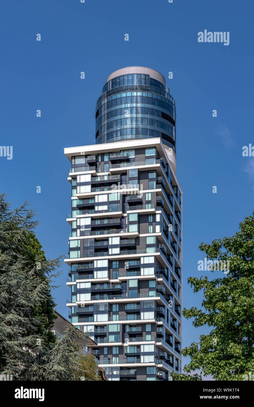 Henninger Turm tower block in Frankfurt. The tower replaces a near identical grain silo for Henninger beer. The top is in the shape of a beer barrel. Stock Photo
