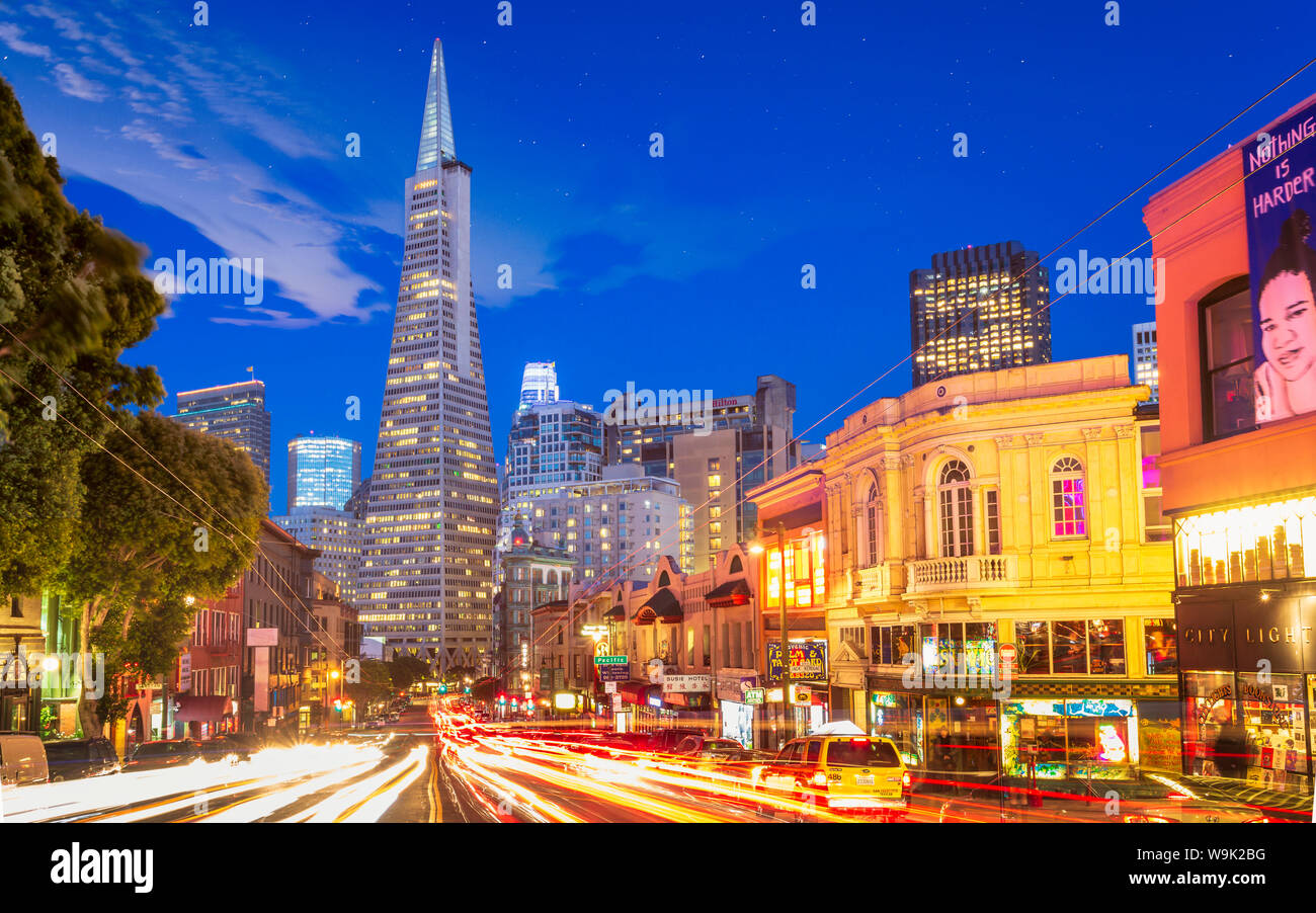 View of Transamerica Pyramid building on Columbus Avenue and car trail lights, San Francisco, California, United States of America, North America Stock Photo