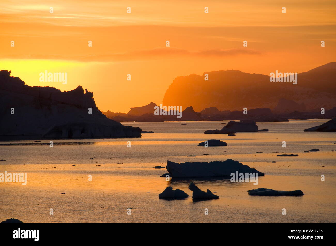 Sunrise on ice in the Antarctic Sound, Antarctic Peninsula, Antarctica, Polar Regions Stock Photo