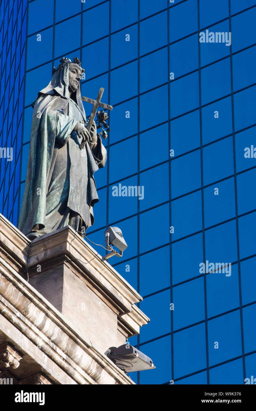 Statue on the Cathedral Metropolitana and modern office building in Plaza de Armas, Santiago, Chile, South America Stock Photo