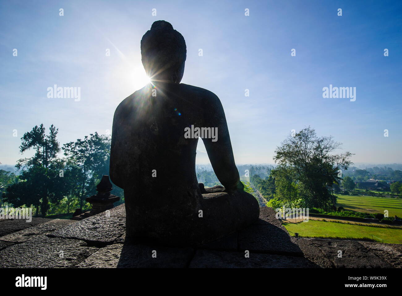 Backlight of a sitting Buddha in the temple complex of Borobodur, UNESCO World Heritage Site, Java, Indonesia, Southeast Asia, Asia Stock Photo