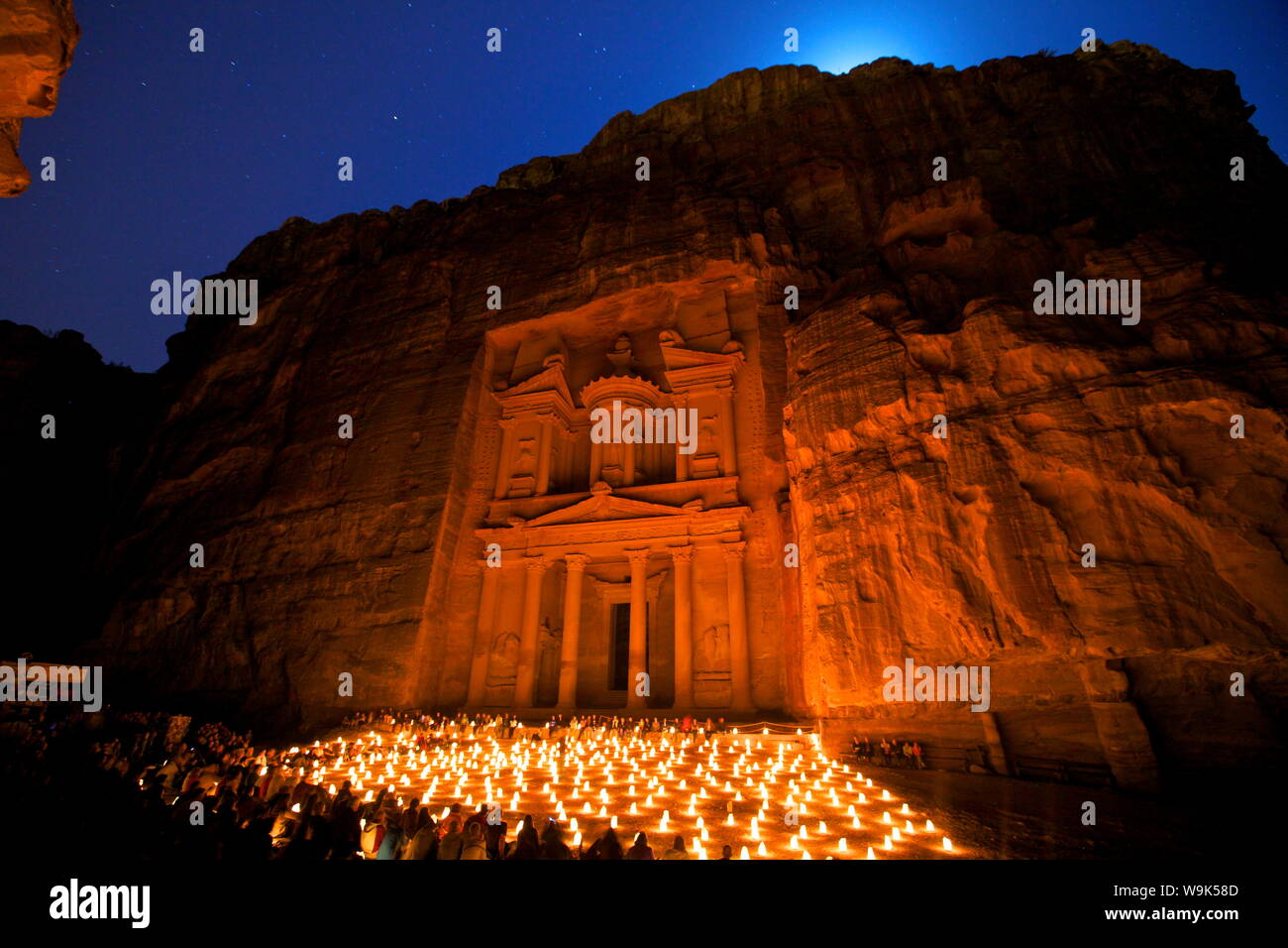 Treasury lit by candles at night, Petra, UNESCO World Heritage Site, Jordan, Middle East Stock Photo