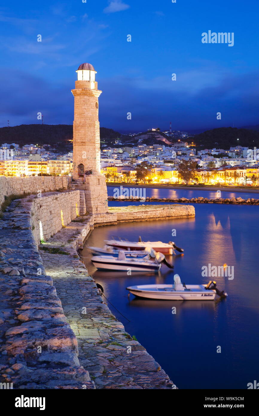Lighthouse at old Venetian harbour, Rethymno (Rethymnon), Crete, Greek Islands, Greece, Europe Stock Photo