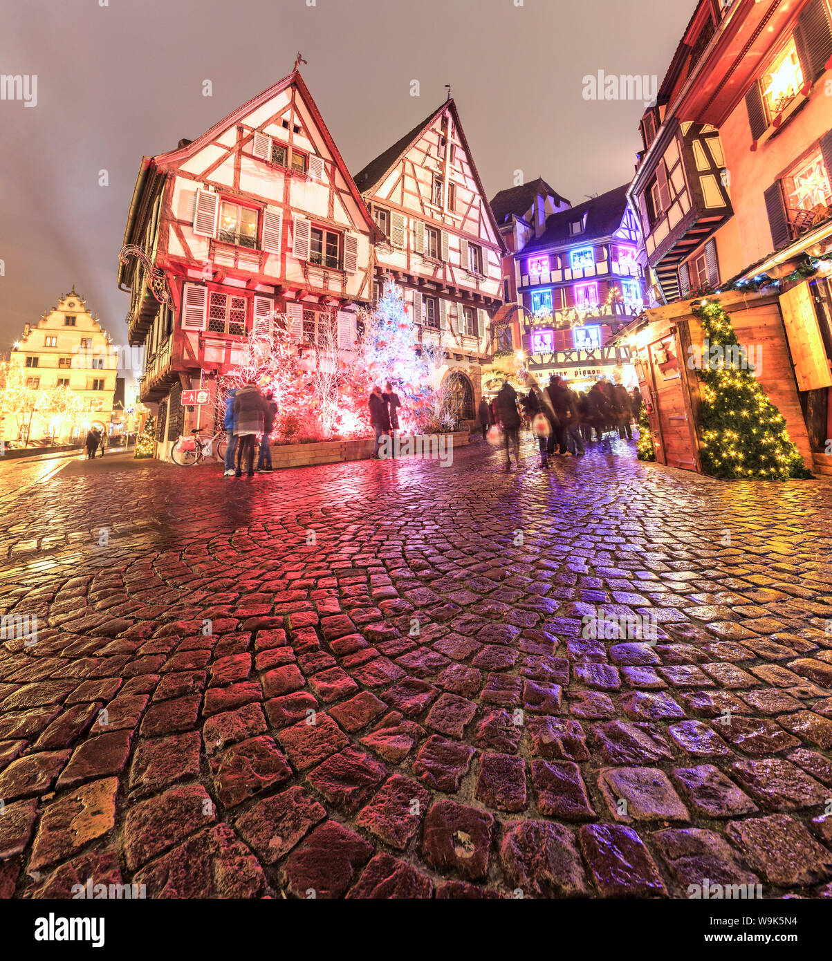 Panorama of typical houses enriched by Christmas ornaments and lights at dusk, Colmar, Haut-Rhin department, Alsace, France, Europe Stock Photo