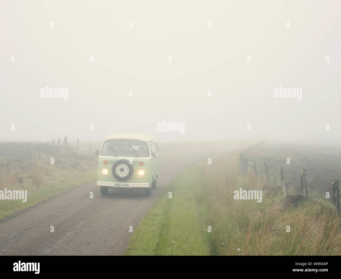 VW Camper van in the fog, Highland, Scotland, United Kingdom, Europe