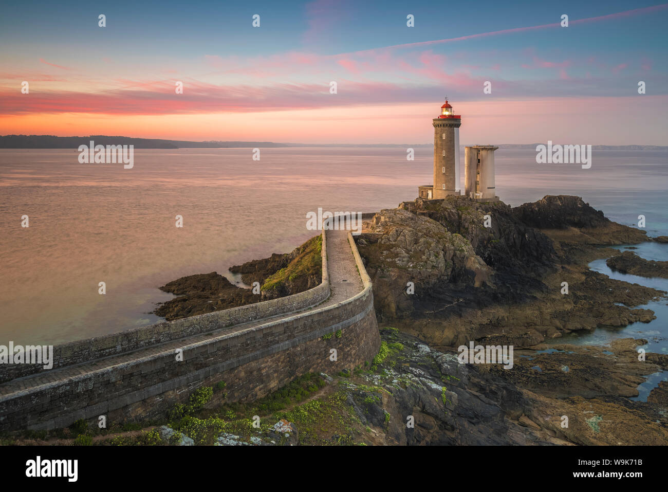 Sunset at lighthouse of Phare du Petit Minou in Finistere, Brittany, France, Europe Stock Photo