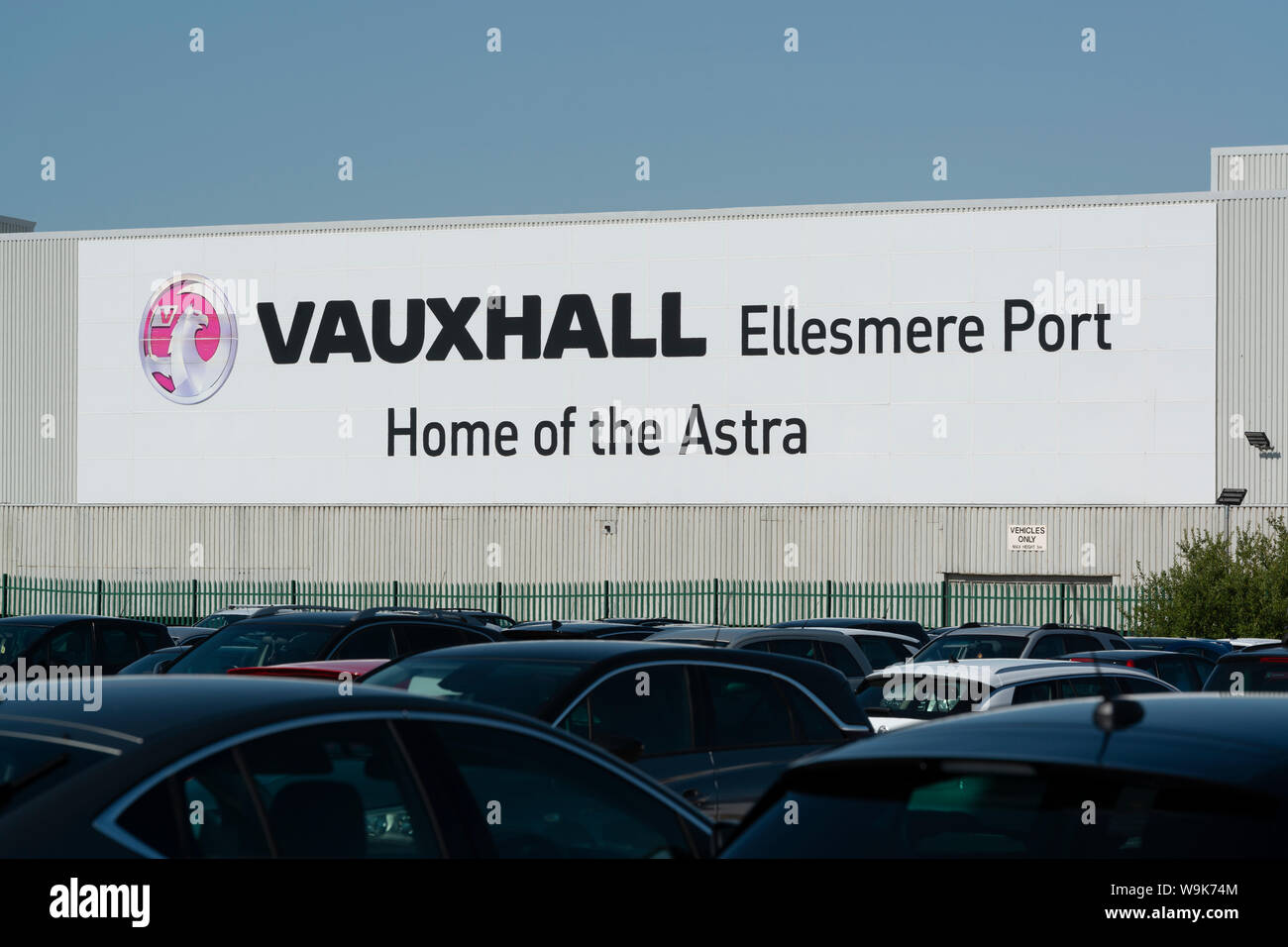 Signage outside the Vauxhall car manufacturing plant located in Ellesmere Port, Wirral, Merseyside, UK. Stock Photo