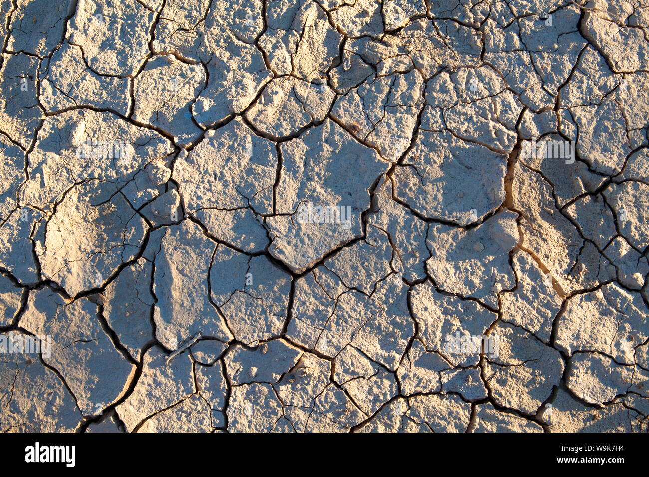 Dried mud/cracked earth at Sossusvlei in the ancient Namib Desert near Sesriem, Namib Naukluft Park, Namibia, Africa Stock Photo