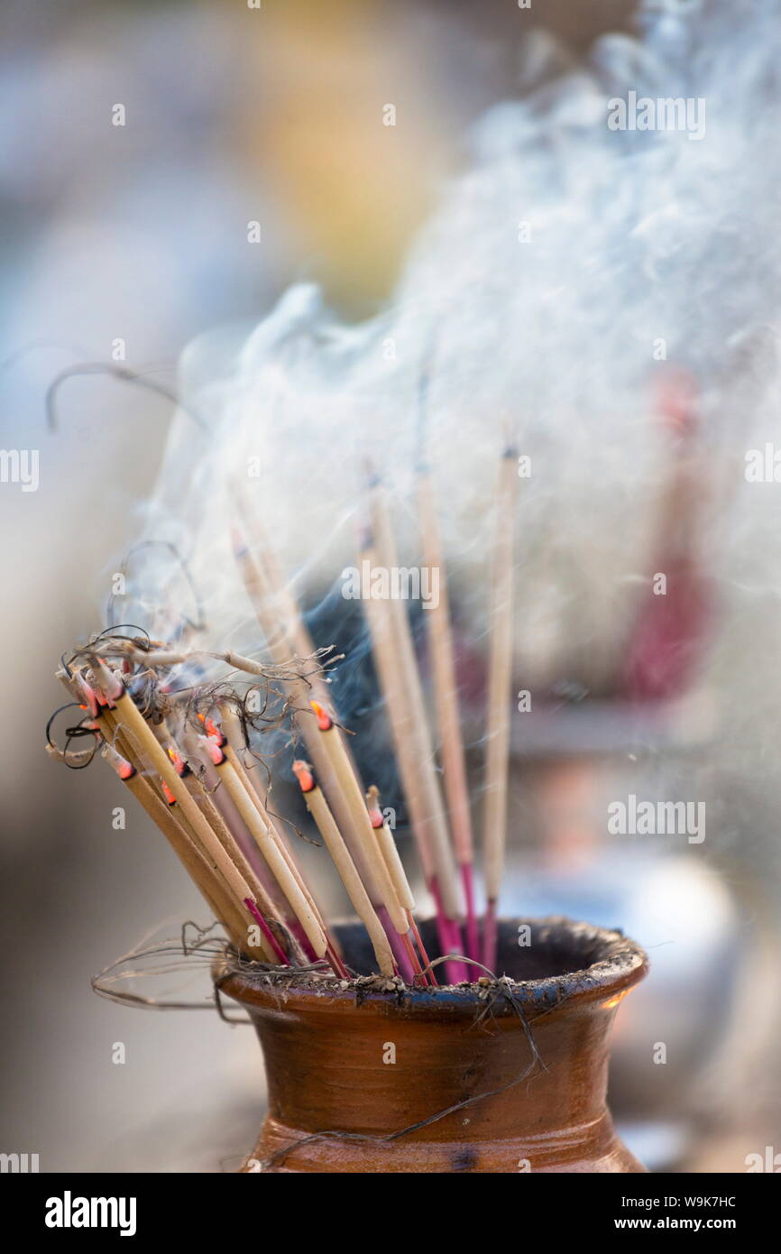 Incense burning at Shwedagon Paya (Pagoda), Yangon (Rangoon), Myanmar (Burma), Asia Stock Photo